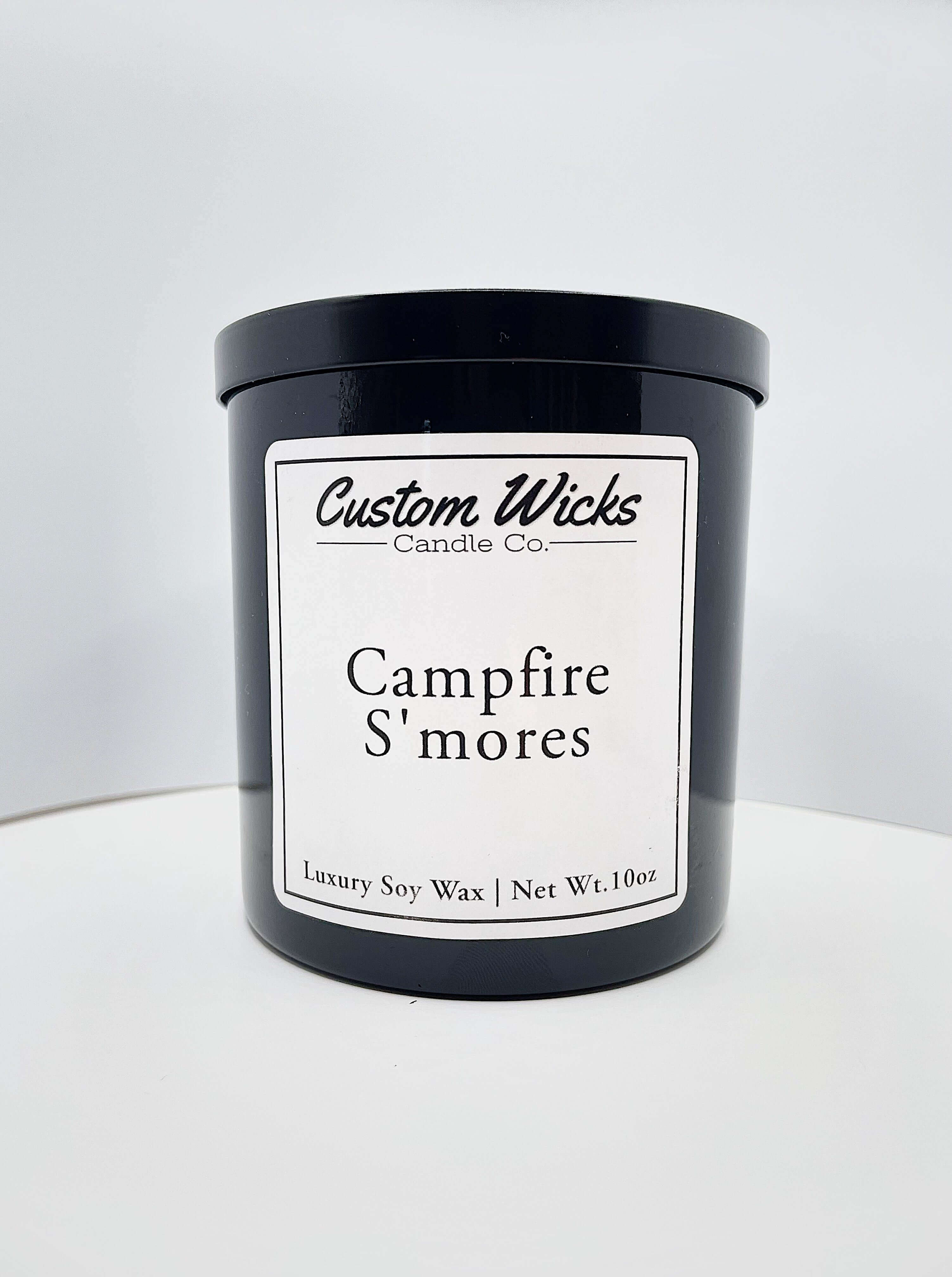 Candle resembling the scent of toasted marshmallows and melted chocolate on a crackling fire.